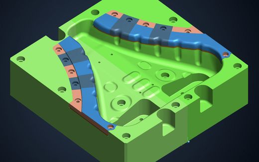 CAD Ansicht eines Formeinsatzes mit farbig markierten Bearbeitungsflächen und Freiformkontur.